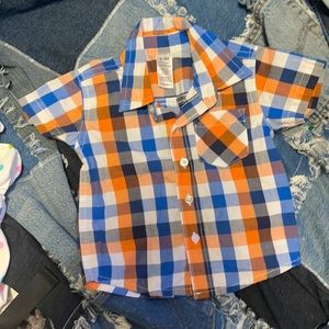 George boys shirt. Size 0-3 mo. New condition.